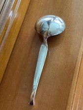 versilberter Sahnelöffel