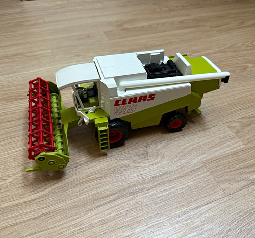 Siku farmer claas - farmer, lexion
