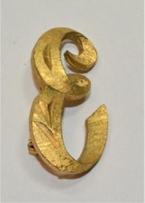 Signierte MAMSELLE Goldfarbene