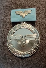 Abzeichen Medaille für 20 Jahre Treue Dienste bei der Deutschen Reichsbahn.