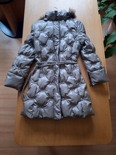 Silberne Daunenjacke