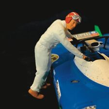 Rennfahrer stützt sich ab (Jo