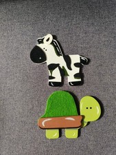 Holztiere mit Filz Details –