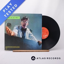 Devo Q: Are We Not Men? A: We