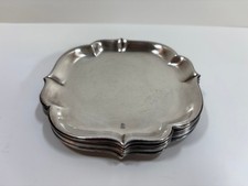 8 schöne antike Untersetzer