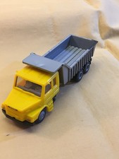 Praline H0 - LKW, Scania Muldenkipper, gelb/grau