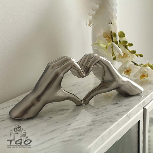 Gilde skulptur hand heart - gilde,