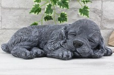 Steinfigur Hund schlafend