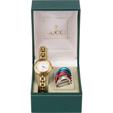 Gucci Gold Tone Change Bezel