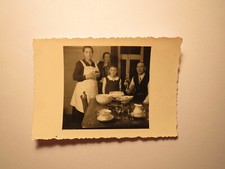 Man & 2 Women & Boy at Dining