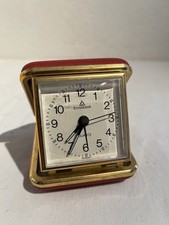 DUGENA , Reisewecker in rotem  Lederetui , alt und funktionsfähig Quartz