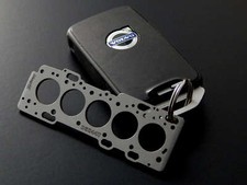 Schlüsselanhänger Miniatur einer Kopfdichtung für Volvo D5244T - made in Germany