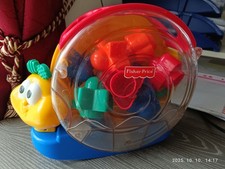 Fischer - Price Musik-Schnecke Steckspiel mit Sound 11 Teilig