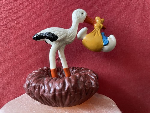 Storch mit baby - , braun
