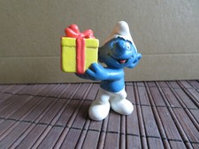 "Schlumpf mit Geschenk" von Mc Donald´s, Spielzeug aus 1996,  ca. 5,5 cm hoch