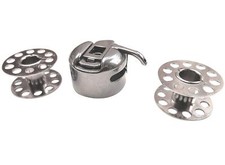 Spulenkapsel und 2 Metall