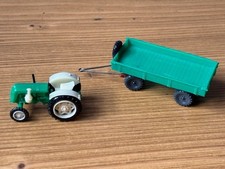 DDR Haufe KG Traktor Famulus mit Anhänger Fahrgestell in BRAUN  (1:87/ H0)