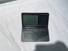 SHARP IQ 8100 M Rechner 64KB Pocket COMPUTER Basic PC Organizer Rarität Sammler