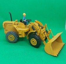 Altes Baumaschinenmodell Caterpillar Radlader CAT 1950 in gutem Zustand