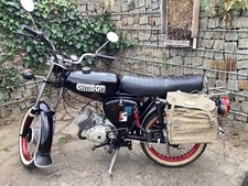 Simson S51, 70 ccm, Schwarz, Weißrandreifen, rote Felgen 