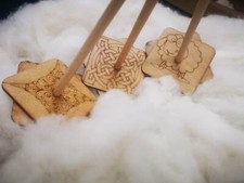 Wollschaaarfe Handspindel aus