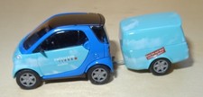 HHAAB01 Busch 48954 Smart Fortwo + Anhänger (clevertrailer) „swisscom“ – H0 1:87