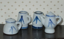 4 Porzellan Miniaturen Krüge