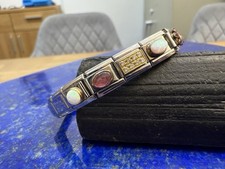 Nomination Designer-Armband aus Edelstahl und 750er Gelbgold / Edelsteine Opale