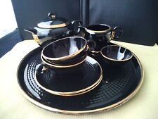 Teeservice "Kopf an Kopf" aus