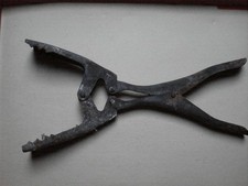 Kohlenzange , Brikettzange 