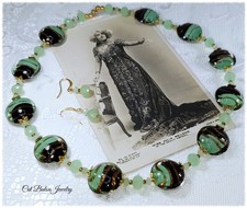 Elegant Perlenkette aus Lampworkperlen in Mint Grün Schwarz Gold CatBalouJewelry