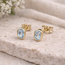 333 Gold Ohrstecker Blautopas