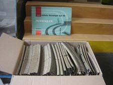 Märklin HO 50-teil. Kurven-Set Metallgleis + Gleisplanbuch "Gebraucht"(701)