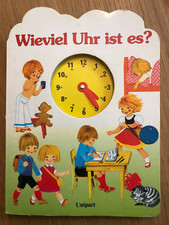 Felicitas Kuhn: Wieviel Uhr ist es? Uhrenbuch mit beweglichen Zeigern
