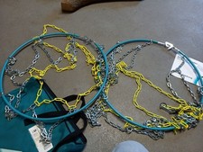 unbenutzte Schneeketten von