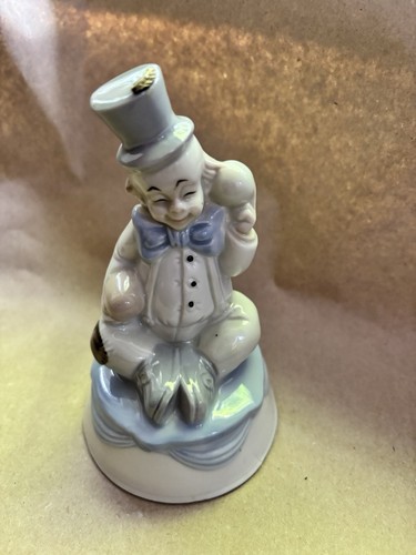 Porzellanfigur sitzender