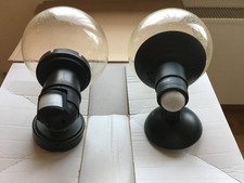 zwei Außenleuchten mit Bewegungsmelder