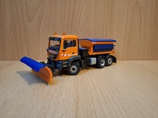 MAN TGS EURO 6 LKW mit Schneepflug und Streuaufbau Komunal in 1:50 mit OVP