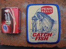 Biete fein gedruckten US Patch/Aufnäher " PENN REELS-Catch Fish " 8,8 x 7cm, NOS