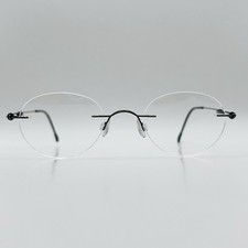Silhouette Brille Herren Damen oval schwarz Titan randlos Mod. M 7368 NEU