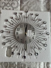 Wanduhr in Silberfarbe, Modell