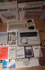 Computer Commodore C64 mit Floppy 154-1I Drucker Handbücher alles original