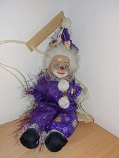 Clown Deko-Figur auf Schaukel