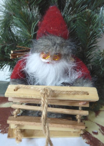 Weihnachtsmann auf der - , leiter
