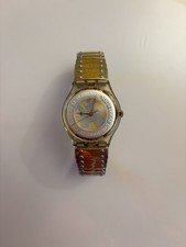 Swatch Selten goldfarben