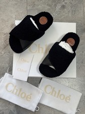 Chloe Wavy Slides Sandalen