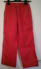 Rote Regenhose mit Gummizug und Druckknopf am Saum  134/140 von Polo Kids
