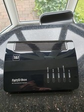 Top: AVM FRITZ!Box 7590 AX v2 in Schwarz, Produktionsjahr 2024