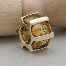 Anhänger Läufer mit Citrin Besatz in 375/9K Gelbgold