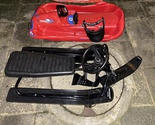 schlitten mit lenkrad und bremse